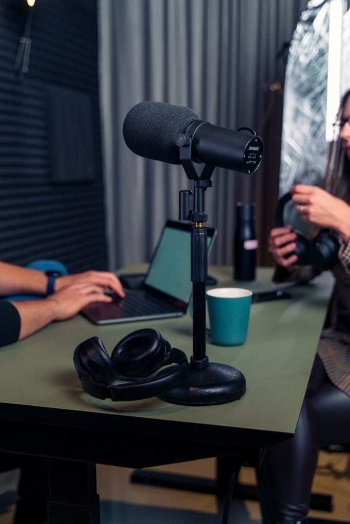 Podcast studio with focus on microphone